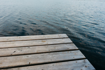 Fototapeta premium small wood bridge with blue water
