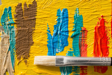Abstract painting background with paintbrush. Wallpaper for a painter exhibition or paint factory