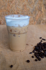 Ice coffee with milk and coffee bean