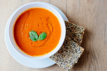 Fresh creamy tomato soup with basil