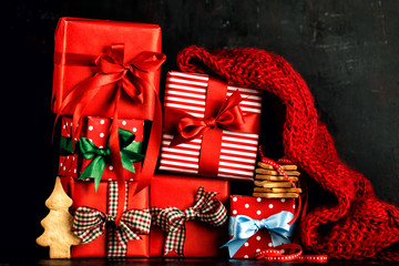 Stacked colorful presents and cookies