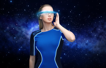 woman in virtual reality 3d glasses over black