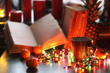 christmas table fruits and drinks with color garland