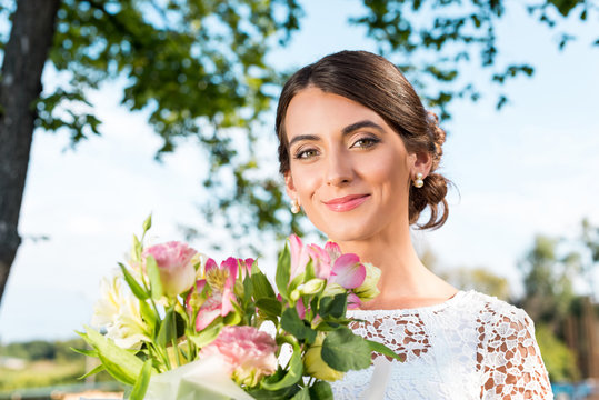 beautiful woman with bouquet of flowers