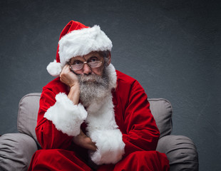 Bored Santa Claus on the armchair