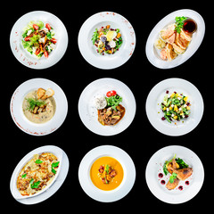 set of various plates of food isolated on black background with clipping path for Menu