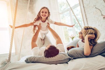 Family in bedroom