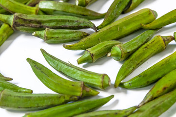 Fresh young okra isolated on white background