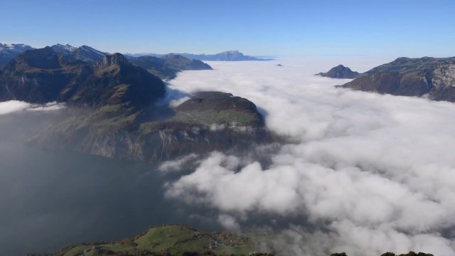 Stoos (1,300 &ndash; 1,935 metres above sea level) The circle trail around lake lucerne. Aerial landscape.  Morschach. View Point Stoos top of the mountain. The clouds are floating under your feet.