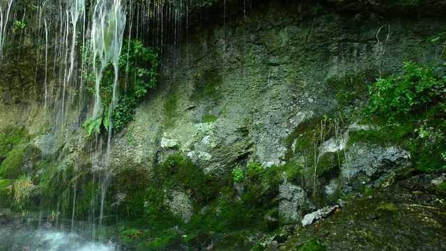 Waterfall in the autumn forest.