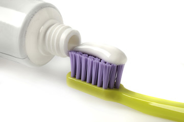 toothbrush with white toothpaste detail