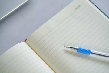 notebook ,notepad, writing pad, drawing pad or legal pad on the table