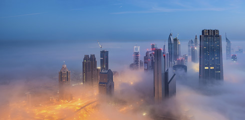 Aerial view of the Dubai city buildings at night