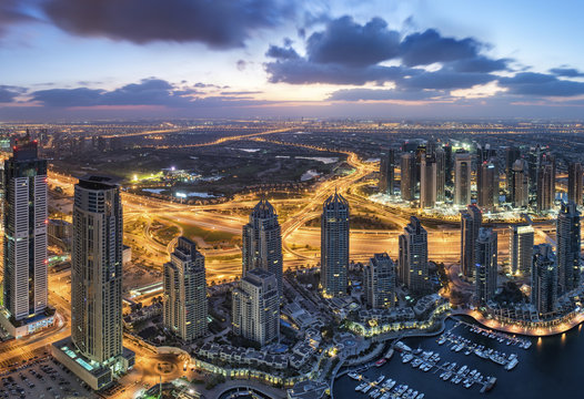 Fototapeta Dubain city elevated view at night, modern architecture