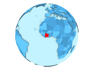 Ivory Coast on blue globe isolated