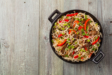 Chinese pasta with beef. Prepared in wok.