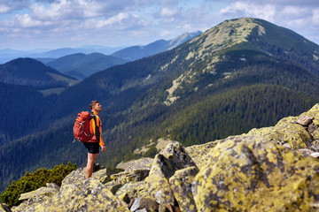 Male traveler from back in the mountains