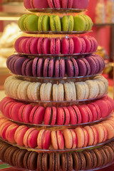 Pile of multicolored macaroons pastry close up