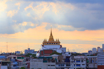 Golden pagoda of Wat Saket Temple in sunset time