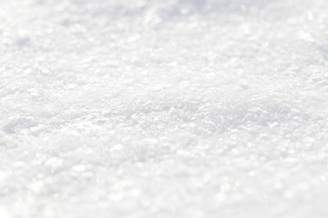 Obraz premium Background of a snowy white cover. The texture of the brilliant snow.