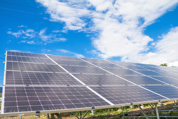 Solar power panels ,Photovoltaic modules for innovation green energy for life with blue sky background.