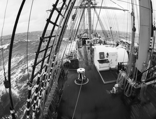 wild weather at sea on an old tallship, traditional sailing vessel