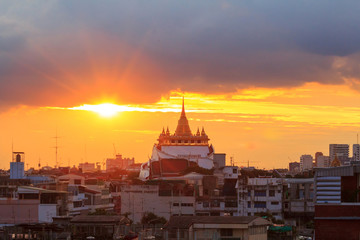 Golden pagoda of Wat Saket Temple in sunset time