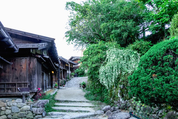 Fototapeta na wymiar Kiso valley is the old town or Japanese traditional wooden buildings for the travelers walking at historic old street in Narai-juku , Nagano Prefecture, JAPAN.