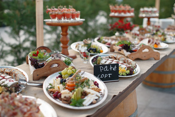Outdoors fourchette table with italian appetizers and fresh flowers