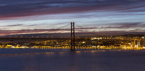 ponte 25 de abril bridge lisbon portugal in the evening
