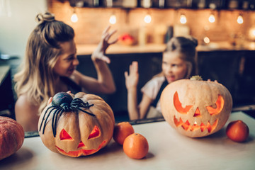 Mom with daughter on Halloween