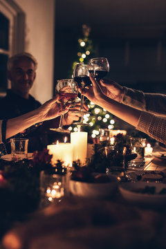 Family toasting at christmas dinner