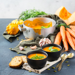 Fall autumn roasted orange pumpkin carrot soup with garlic