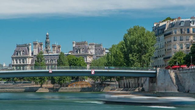Saint-Louis bridge timelapse. Two islands on the River Seine in Paris, France, called Ile de la cite and Ile saint Louis. Paris, France.