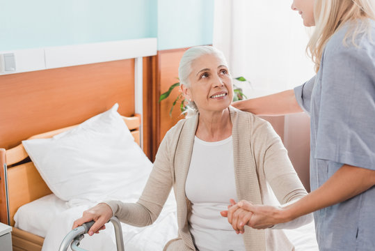 Nurse And Senior Patient With Walker