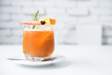 Orange mint soda mocktail with fresh orange.Soft focus of fresh mocktail drink in vintage coffee...