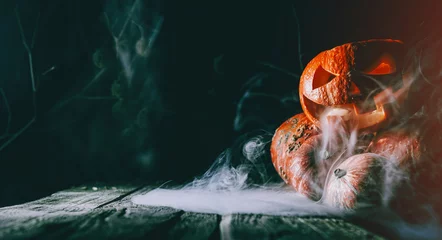 Zelfklevend Fotobehang Pumpkin to celebrate Halloween on a wooden background © Mikhaylovskiy 