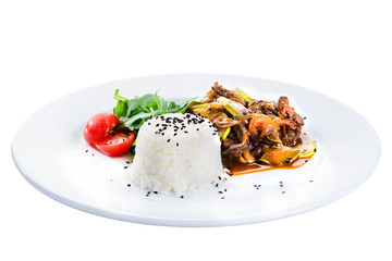 Delicious beef with oyster Mushrooms and rice served with tomatoes and sauce in a white plate, isolated on white background. Autumn menu in an Italian restaurant. Hotel service photo background