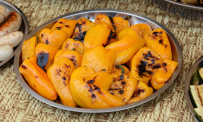 Roasted peppers. Peppers on a grill.
