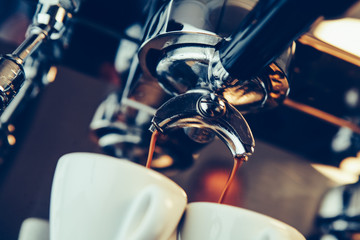 Barista preparing espresso at coffee shop