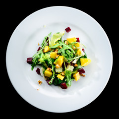 Tasty mushroom cream soup with parsley and spices in a white plate served with toast bread, isolated on white background. Top view, flat, overhead. Autumn menu in an Italian restaurant
