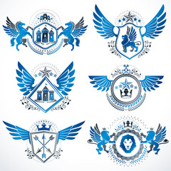 Fototapeta na wymiar Vintage decorative heraldic vector emblems composed with elements like eagle wings, religious crosses, armory and medieval castles, animals. Collection of classy symbolic illustrations.