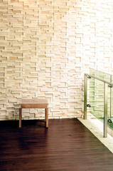 White brick wall and table on the wooden floor