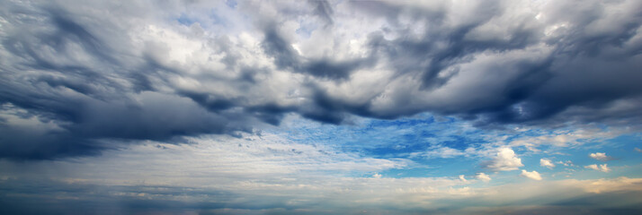Amazing  sky panorama. Panoramic dark storm cloud background
