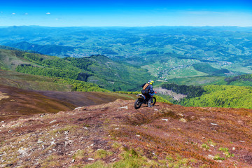 Fototapeta na wymiar motorcyclist riding in the mountains