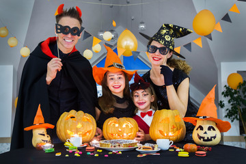  family celebrates halloween