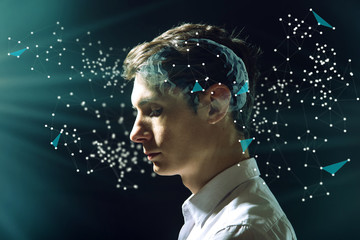 The man's head businessman with digital brain and connections of neurons. The concept of artificial...