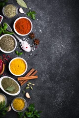 Acrylic prints Aromatic Set of Various spices and herbs on black slate table. 