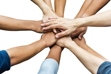 Image of group of overlapping hands against white background.
