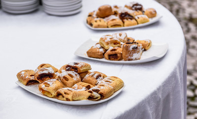 Tasty sweets pastry at business event catering buffet.